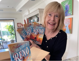 Lucy H. Hedrick with her book