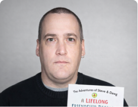 Author holding a children's book